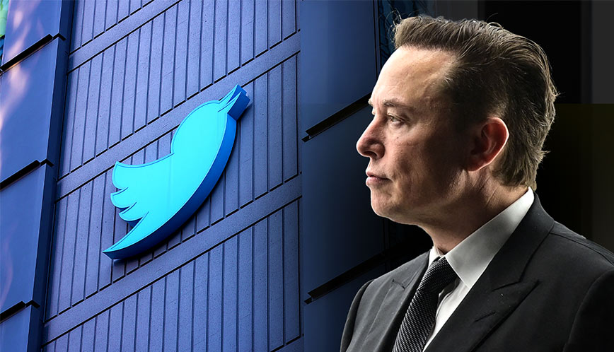 Elon musk's twitter logo in front of a building. Elon musk's twitter logo in front of a building