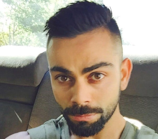 Short Fade Hairstyle with Beard