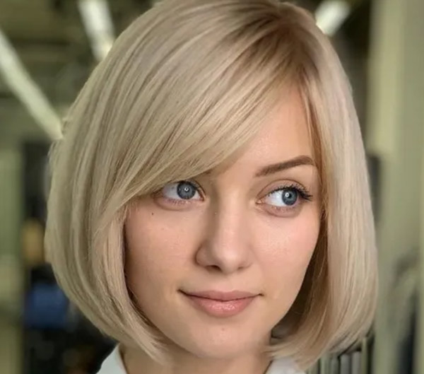 19.Delicate Classic Bob with Side-Swept Bangs