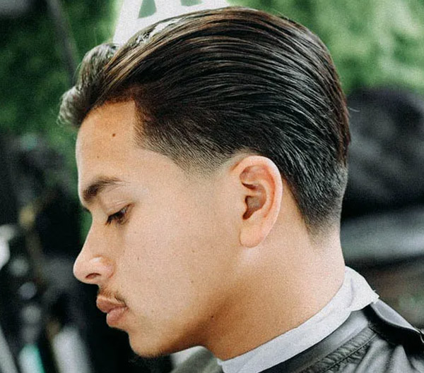 21.Low Fade Haircut with Side Bangs