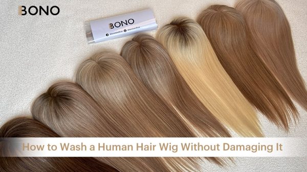 several human hair wigs displayed in a row