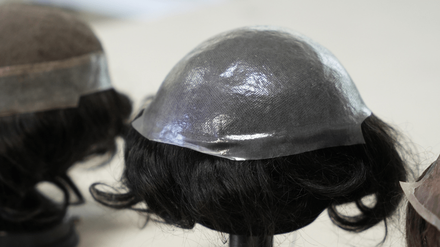 a skin toupee showing the base